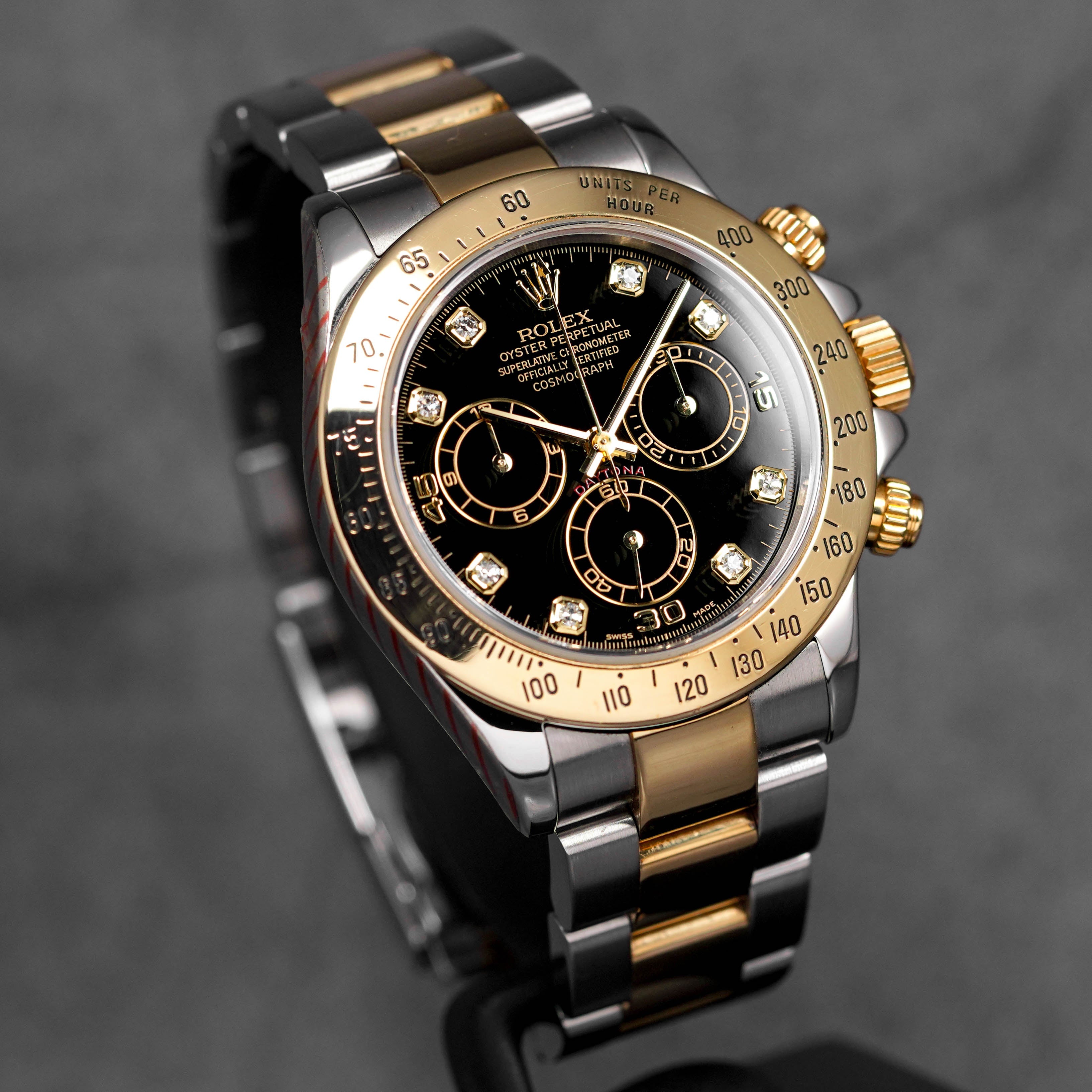 DAYTONA TWOTONE YELLOWGOLD BLACK DIAMOND DIAL (2004)