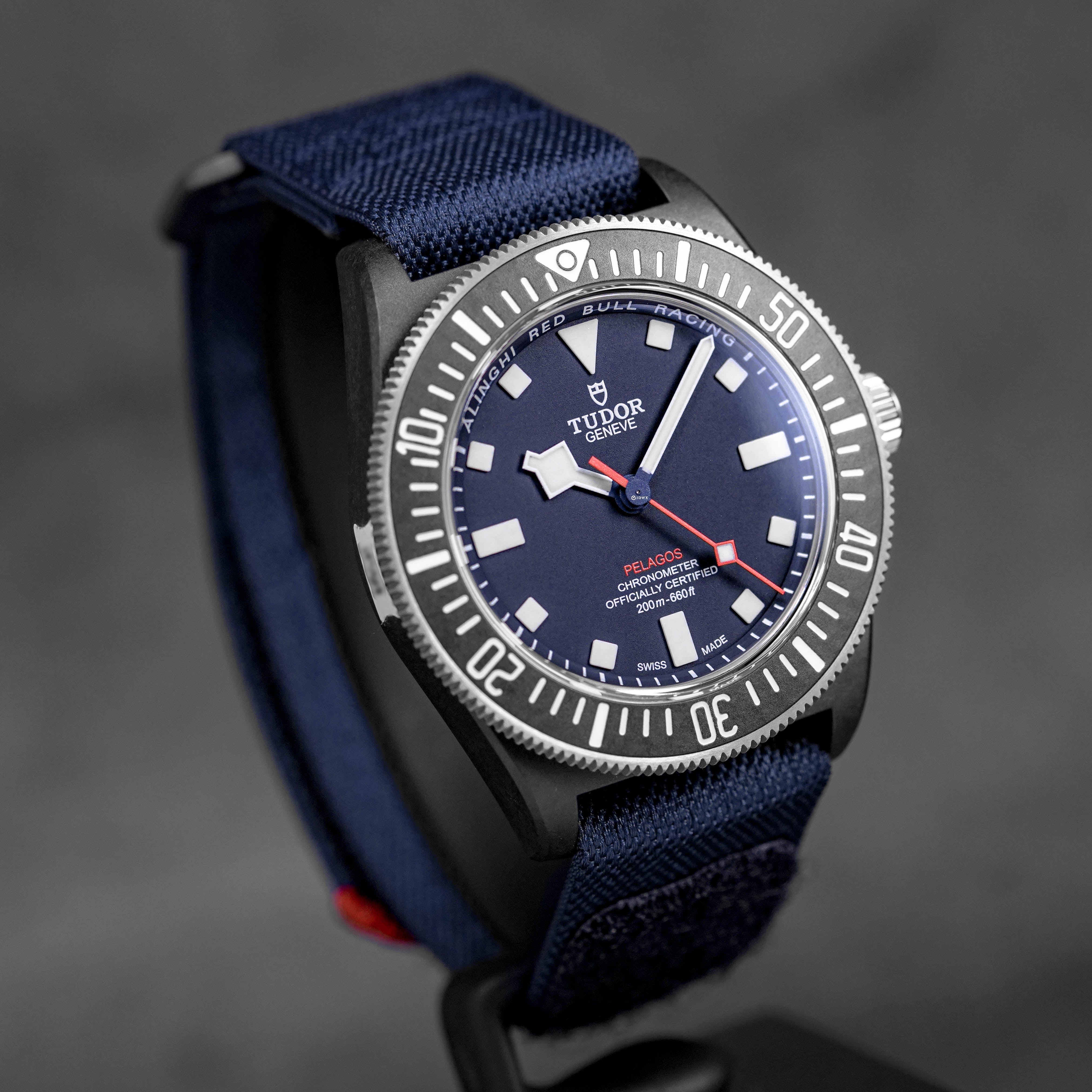 PELAGOS FXD BLACK CARBON 'ALINGHI RED BULL' BLUE DIAL (2025)