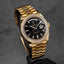 DAYDATE 40MM YELLOWGOLD BLACK DIAMOND BAGUETTE DIAL DIAMOND BEZEL (2021)